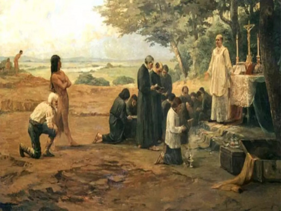 a imagem retrata a reprodução de uma missão jesuíta que acontecia na época do brasil colonial
